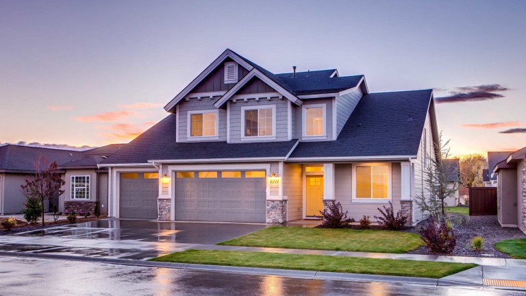 blue-and-gray-concrete-house-with-attic-during-twilight-186077_optimized-min